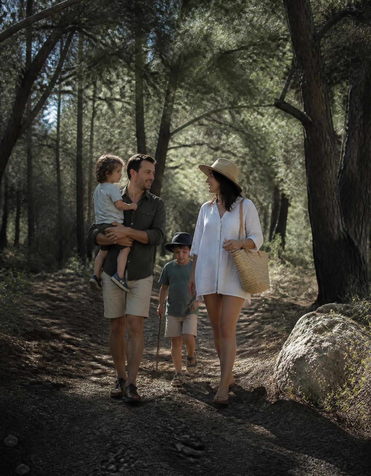 A family walking a shaded pine trail near Limassol in late afternoon light